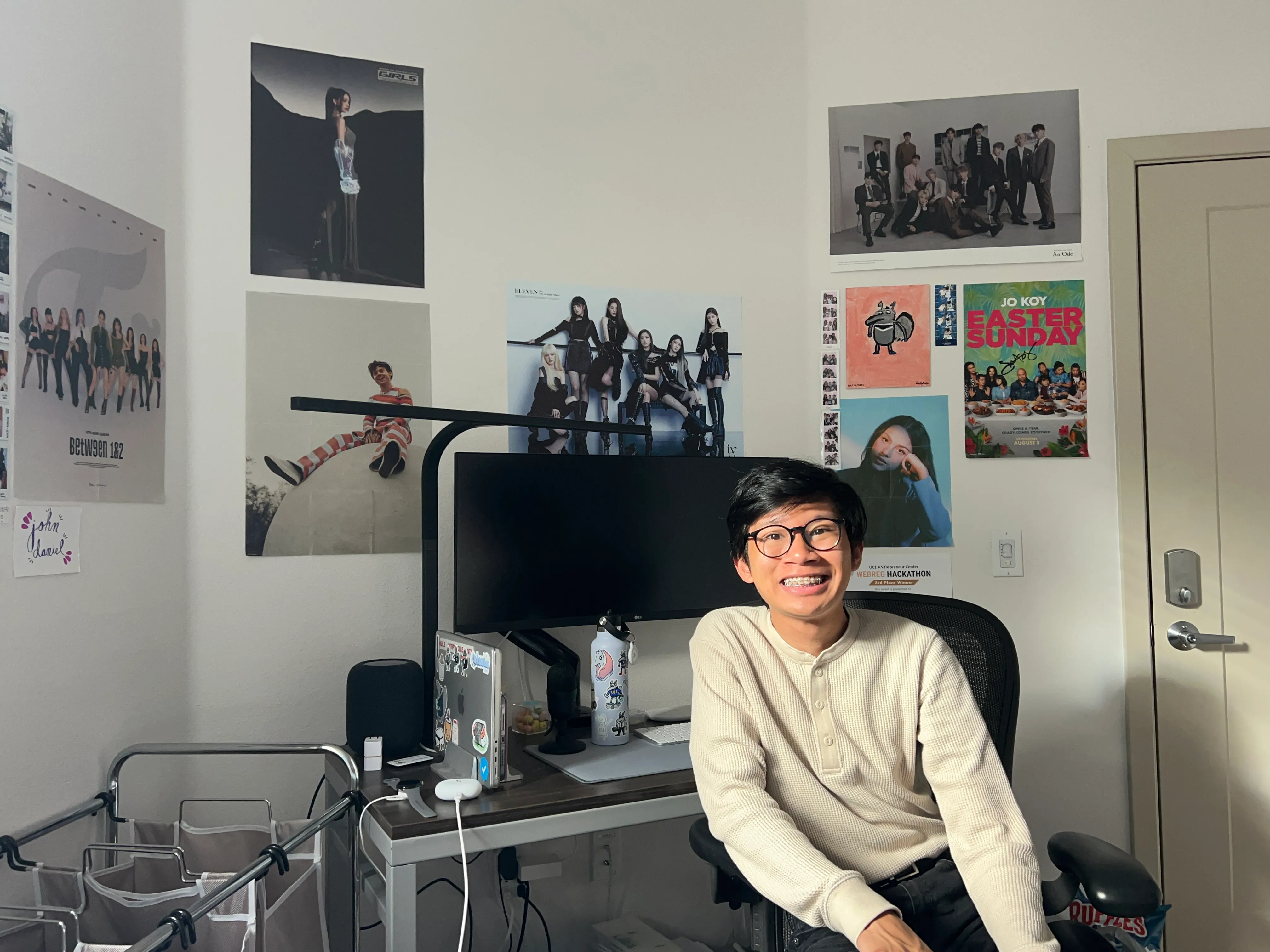 John Daniel sitting down at his desk
